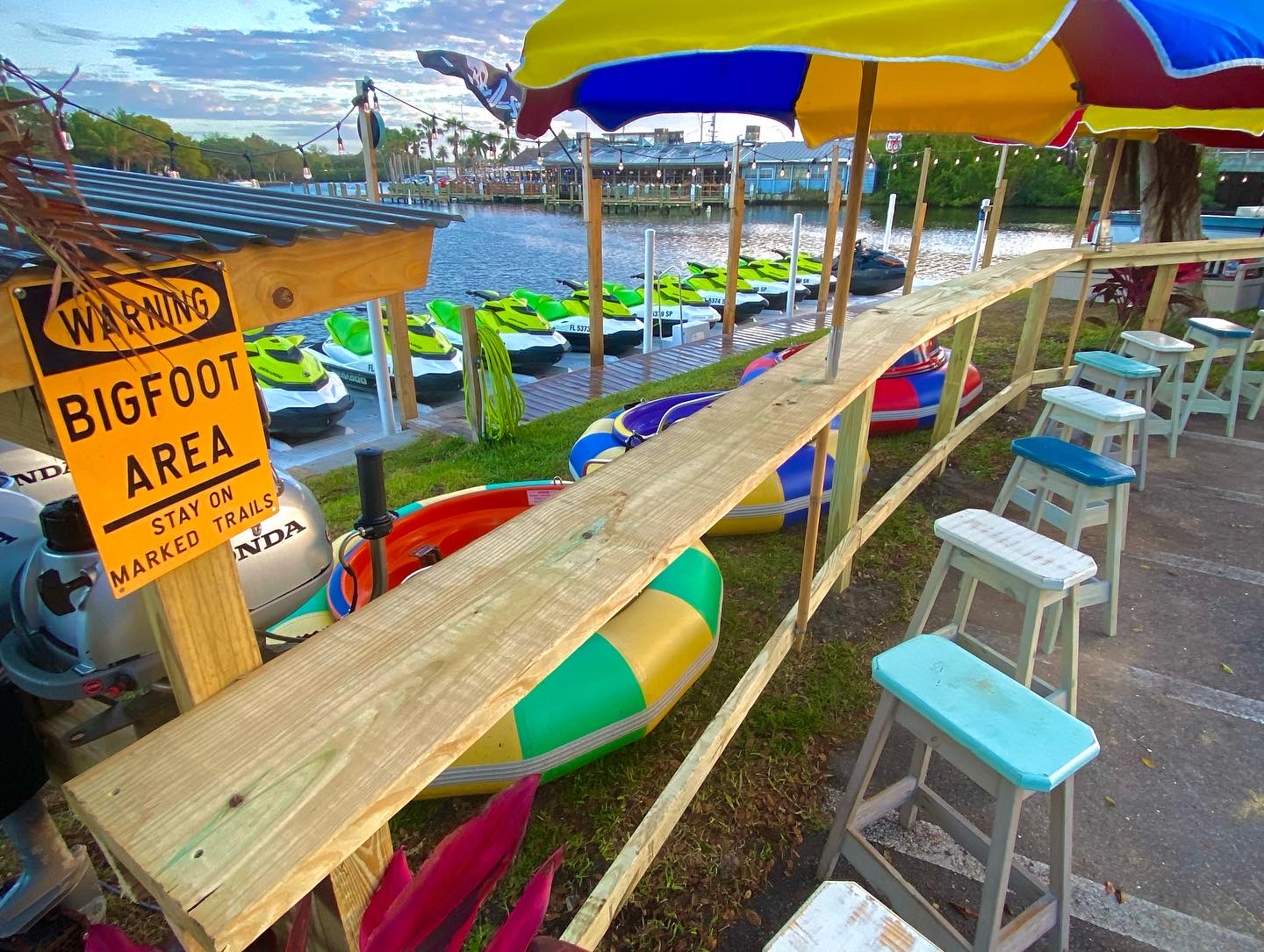 a group of lawn chairs sitting on top of a beach