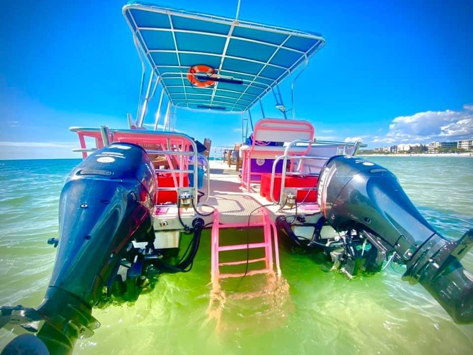 a boat parked next to a body of water