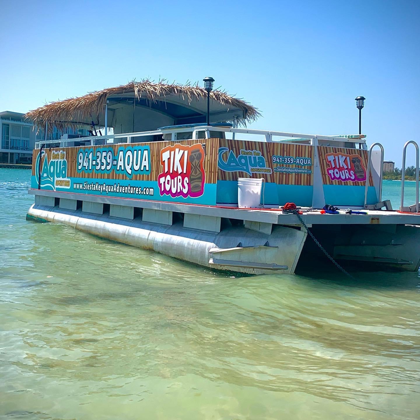 a boat is docked next to a body of water